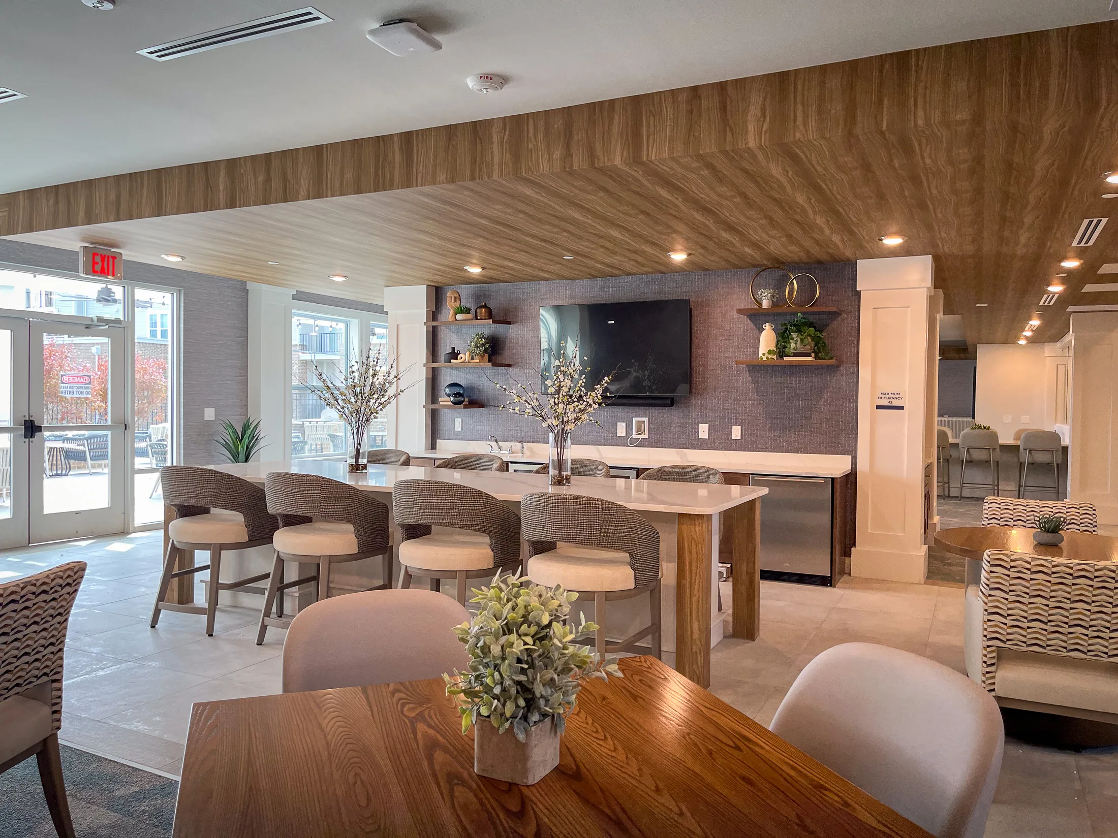 Community bar with wood ceiling at Aspire at the Hill