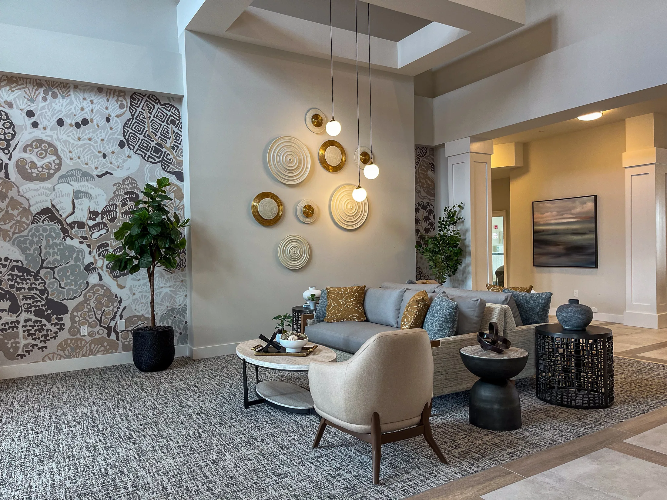 Double-height lobby with mural wall at Aspire at the Hill