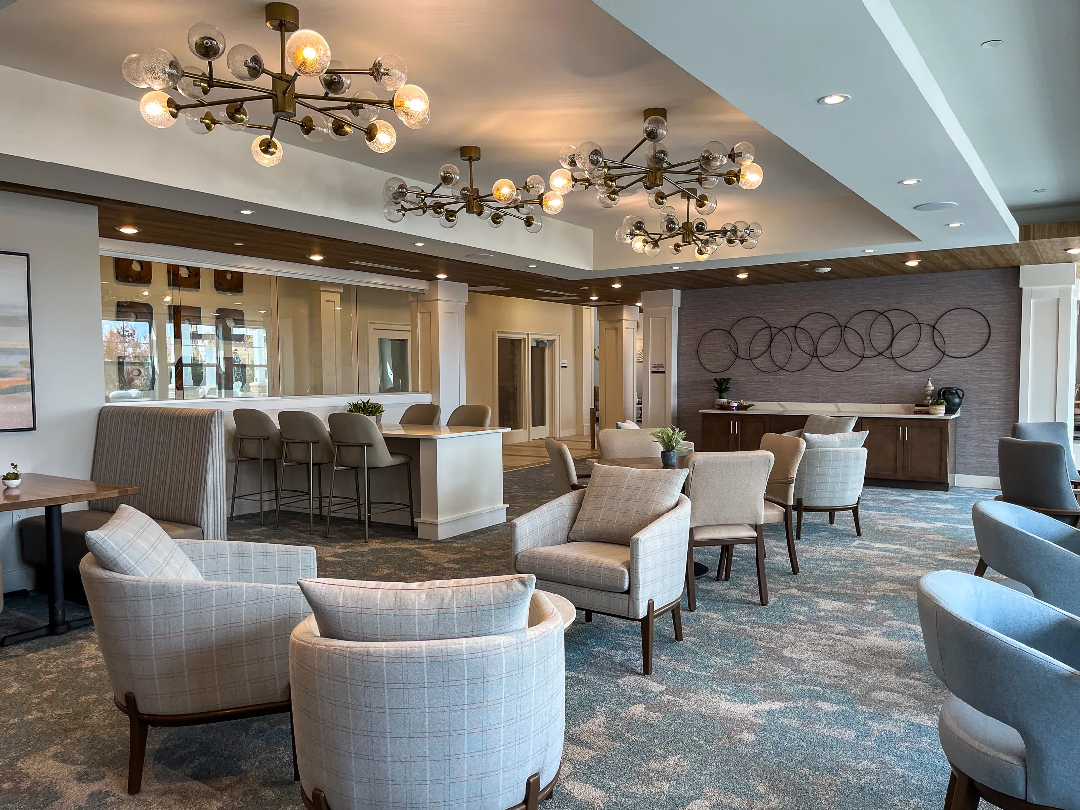 Club lounge with constellation chandeliers at Aspire at the Hill