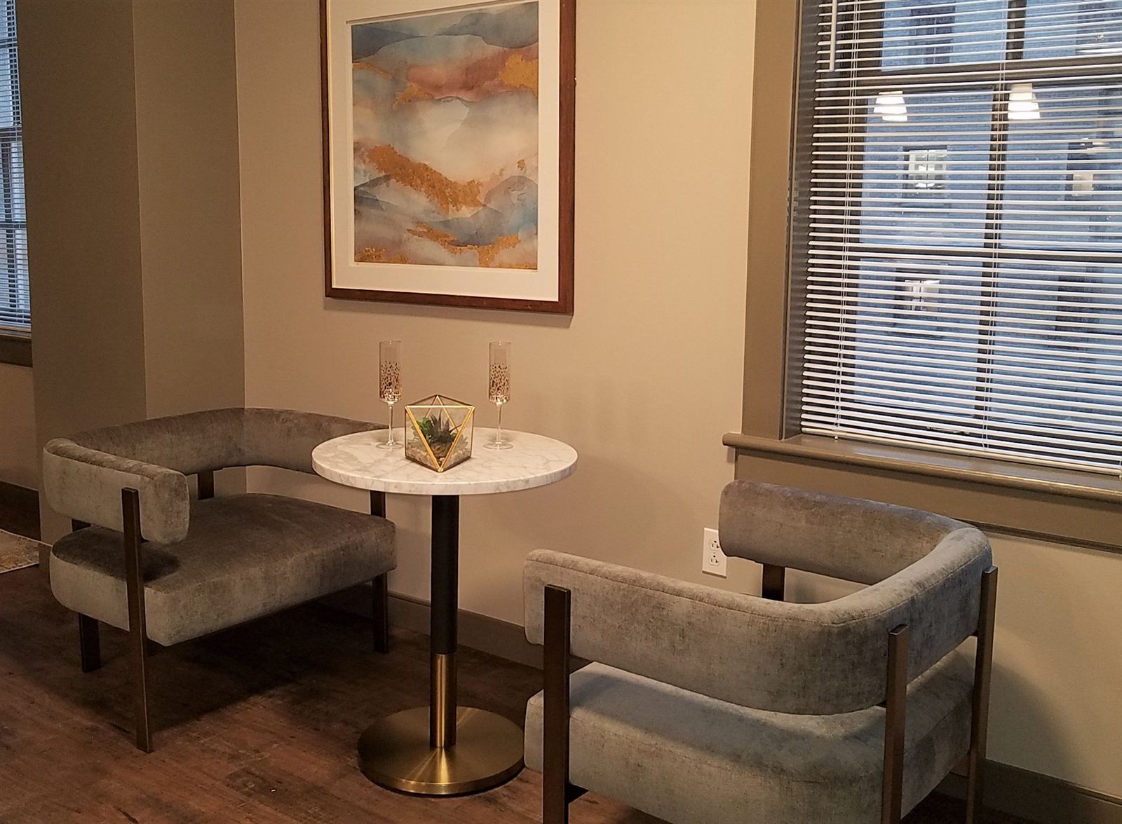 Bistro nook with curved chairs at the Statler Model Suite