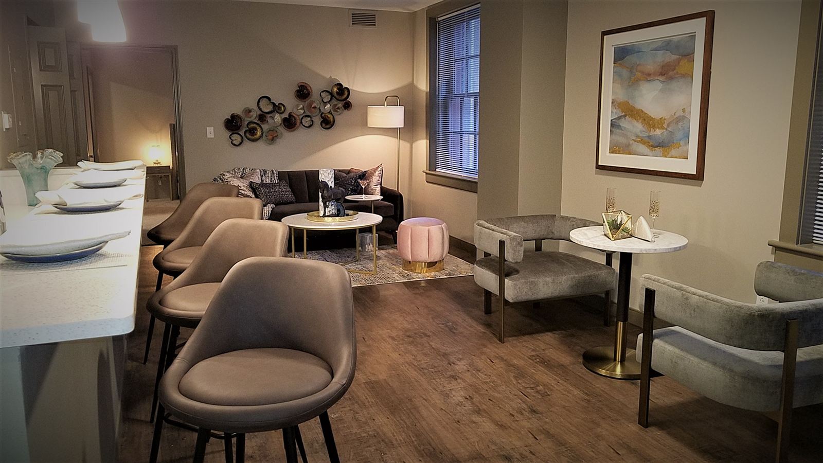 Living and dining view of the Statler Model Suite